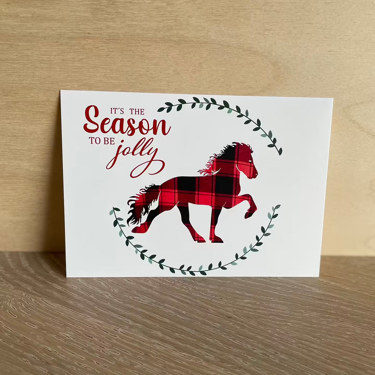 Postkort med julemotiv med springende hest, 4-pakning
