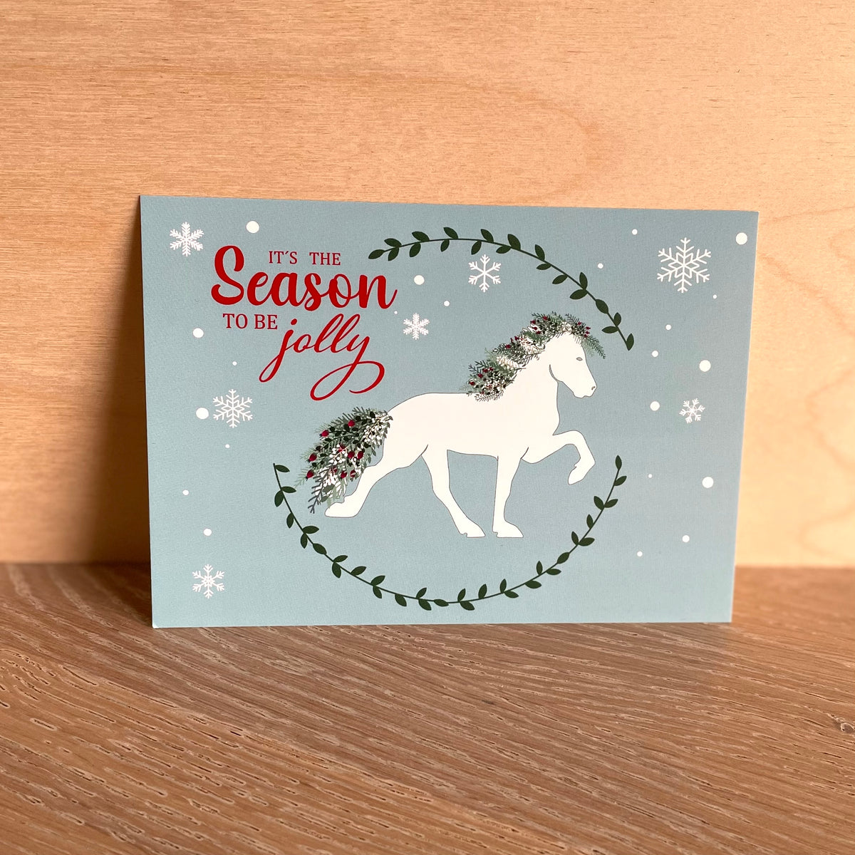Postkort med julemotiv med springende hest, 4-pakning